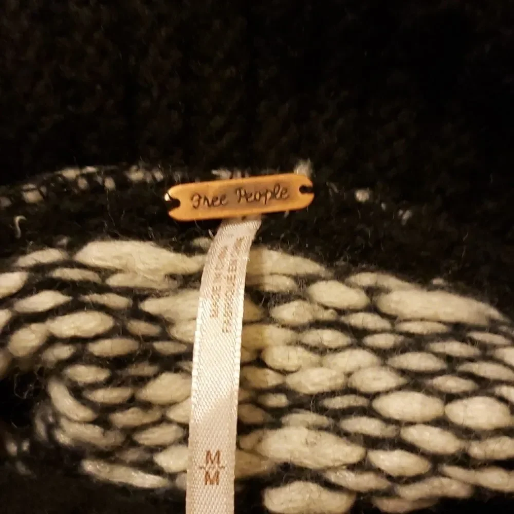 Free people  turtleneck sweater size medium.